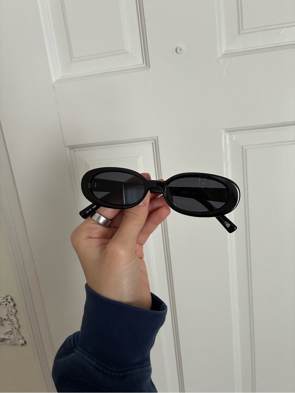 Le Specs Black Oval Sunglasses with Dark Lenses